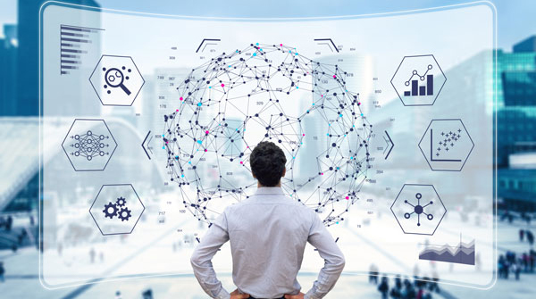 Heart-Technologies-Peoria-IL-IT-Networking_vCIO Man viewing data analytics overlay.